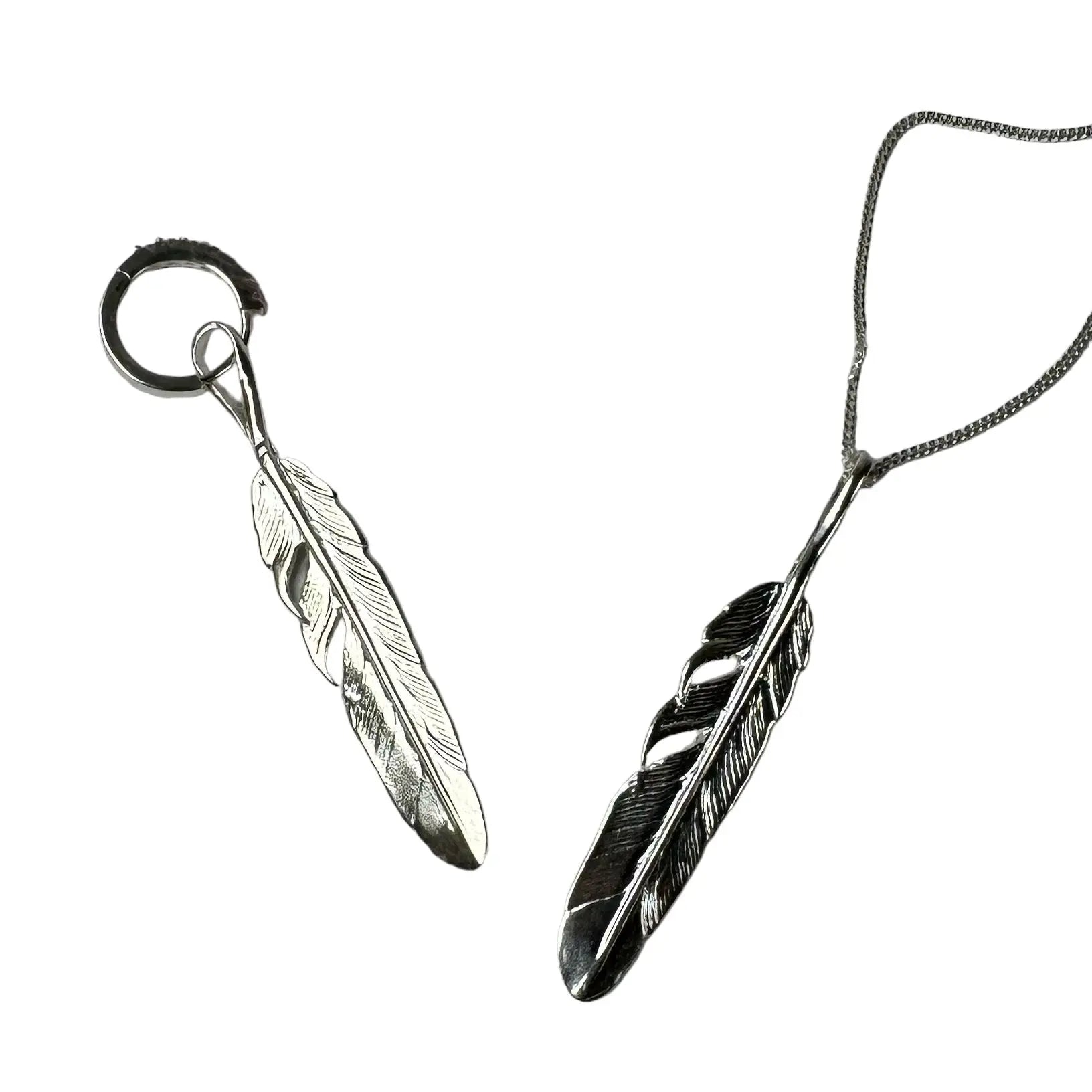 Berlock - Lyckofjäder - L8Hasselblad