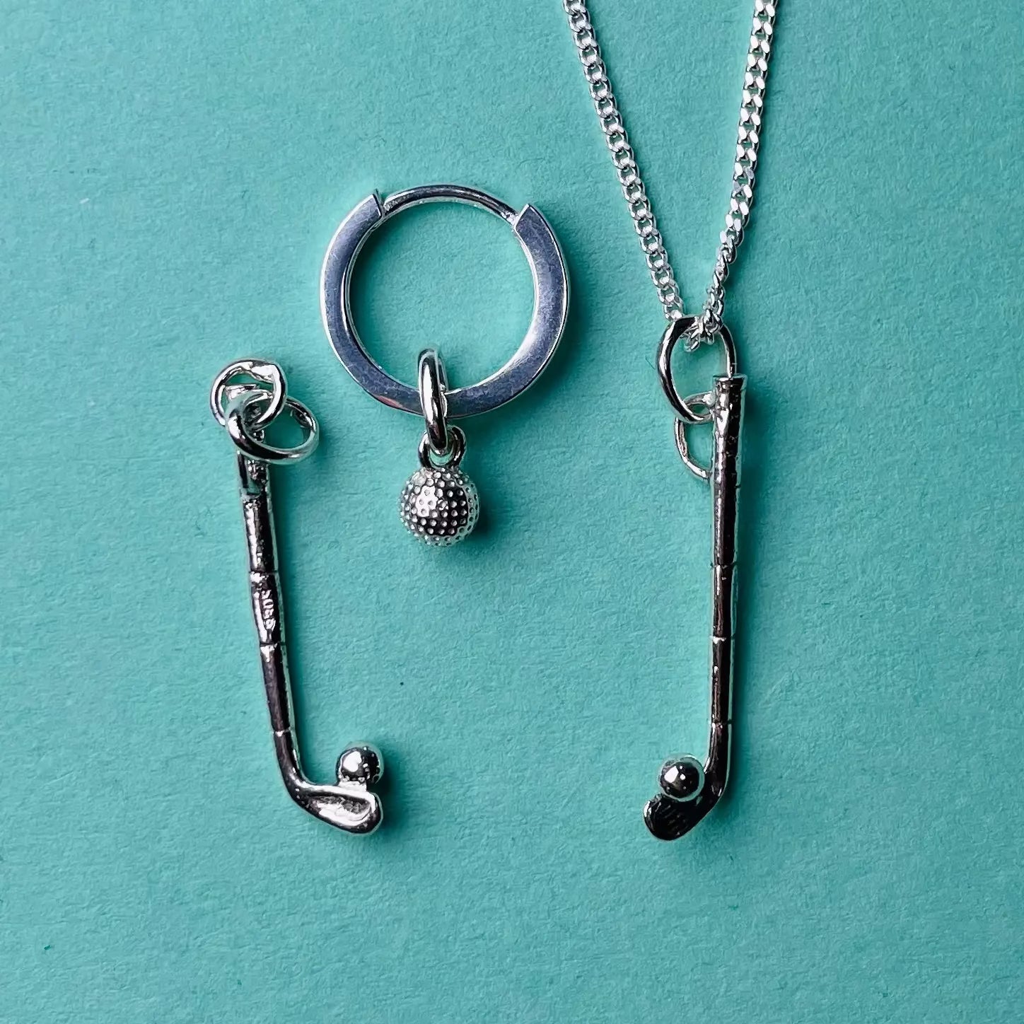 Berlock - Golfboll och golfklubba L8Hasselblad