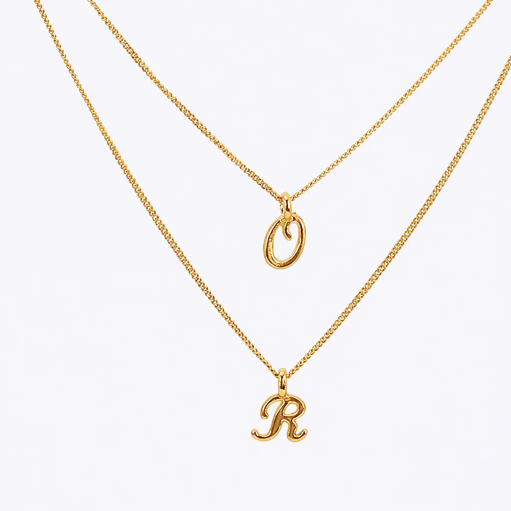 Kursiva bokstäver - halsband L8Hasselblad