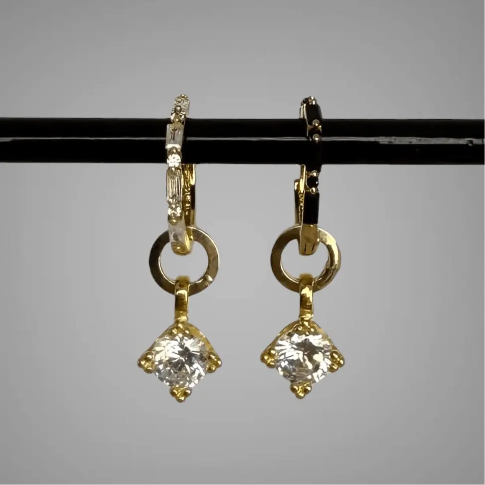 The one - guldörhänge - L8Hasselblad