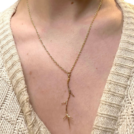 Mounted necklace with branch