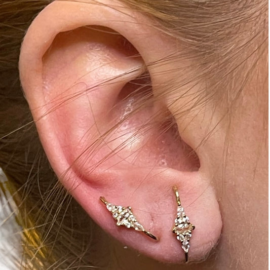 Different stud earring with zircons