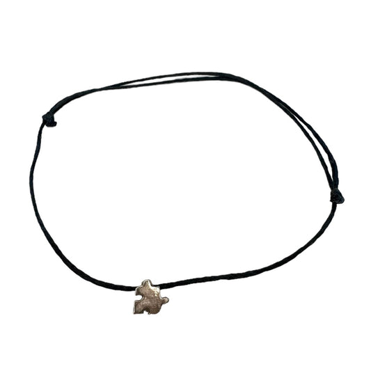 Wire bracelet with puzzle piece