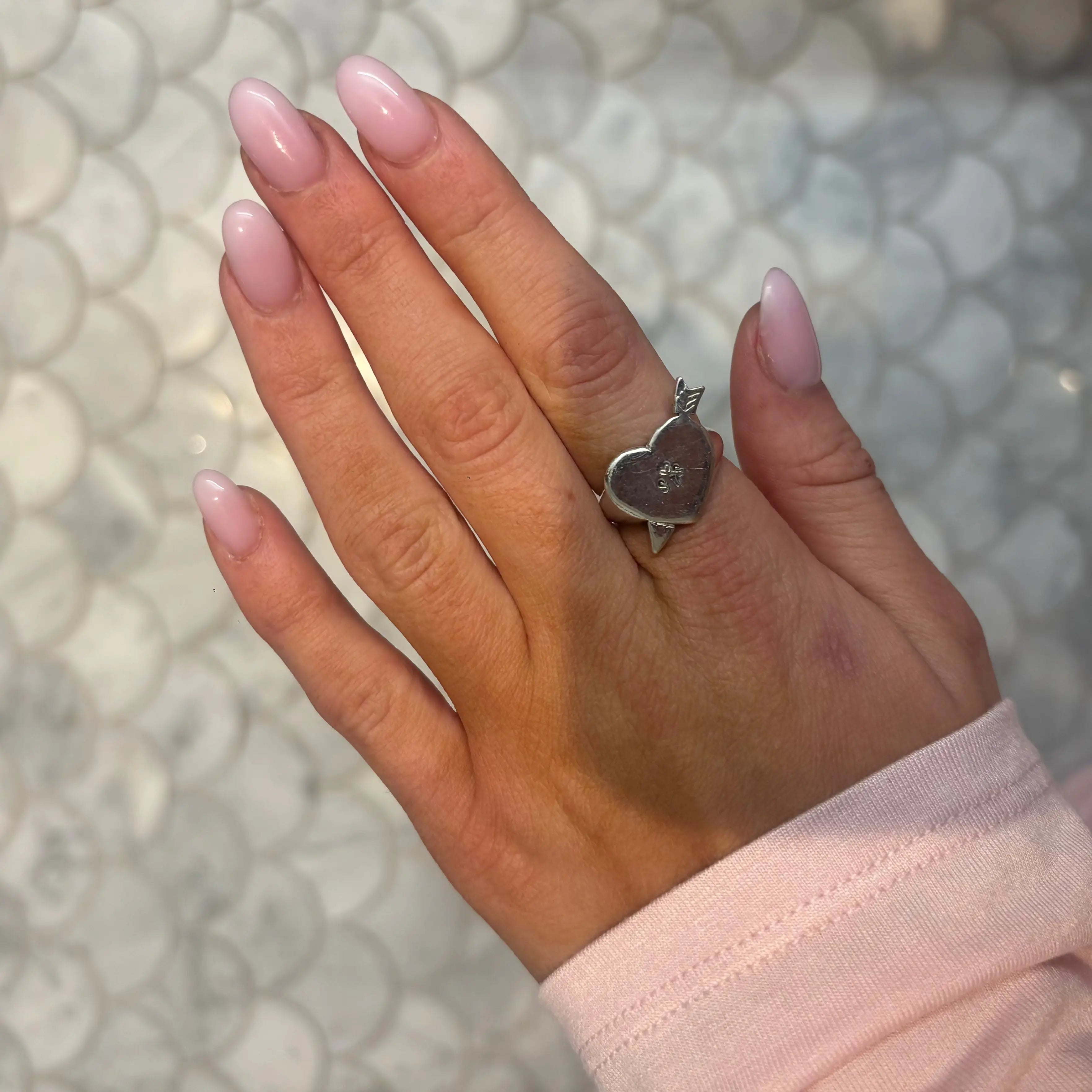 Hjärtklackring med pil L8Hasselblad