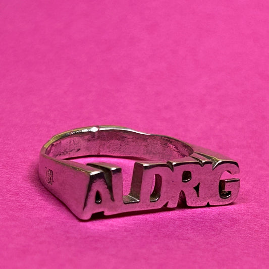 ALDRIG-ring