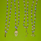 Necklace with pastel beads &amp; various charms