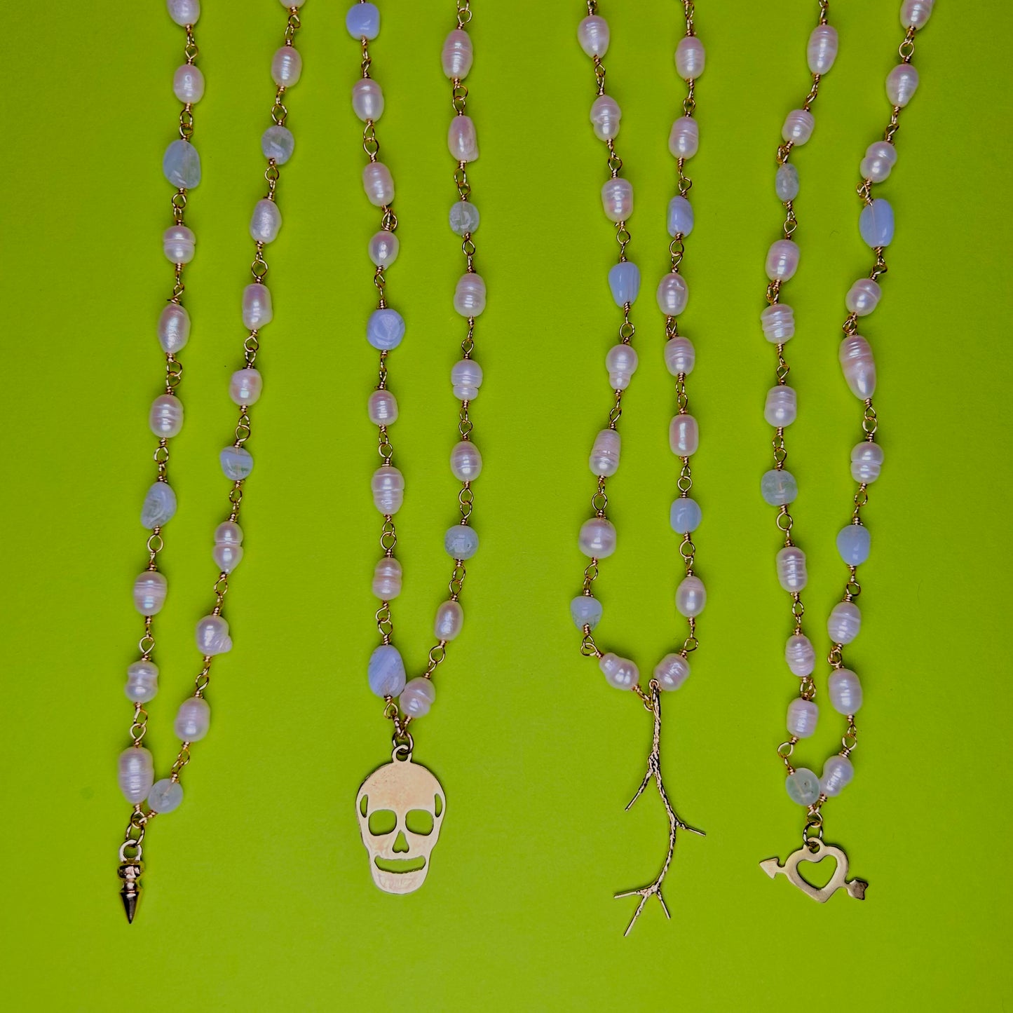 Necklace with pastel beads &amp; various charms