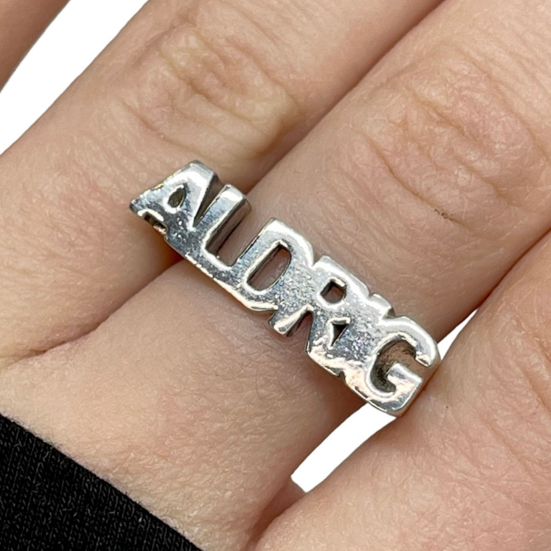 ALDRIG-ring