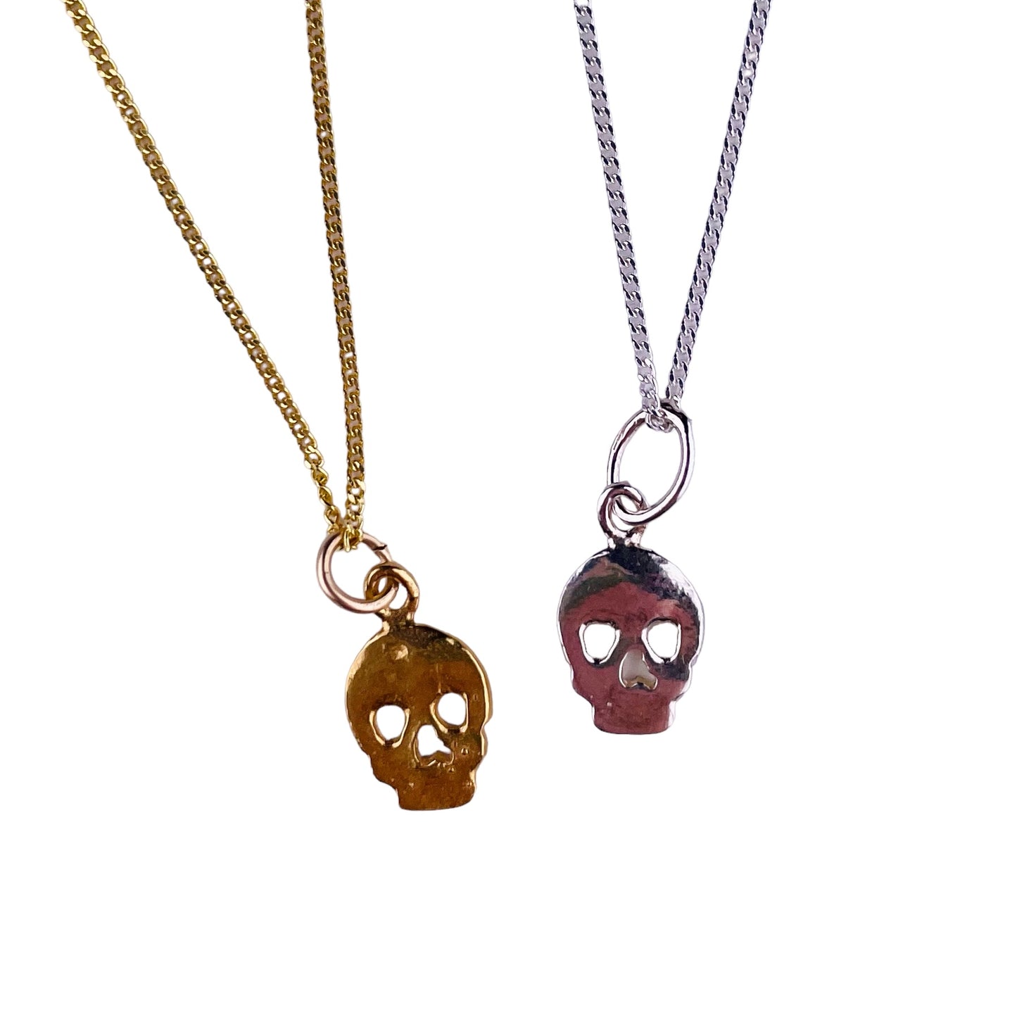 Flat skulls (charms for necklaces)