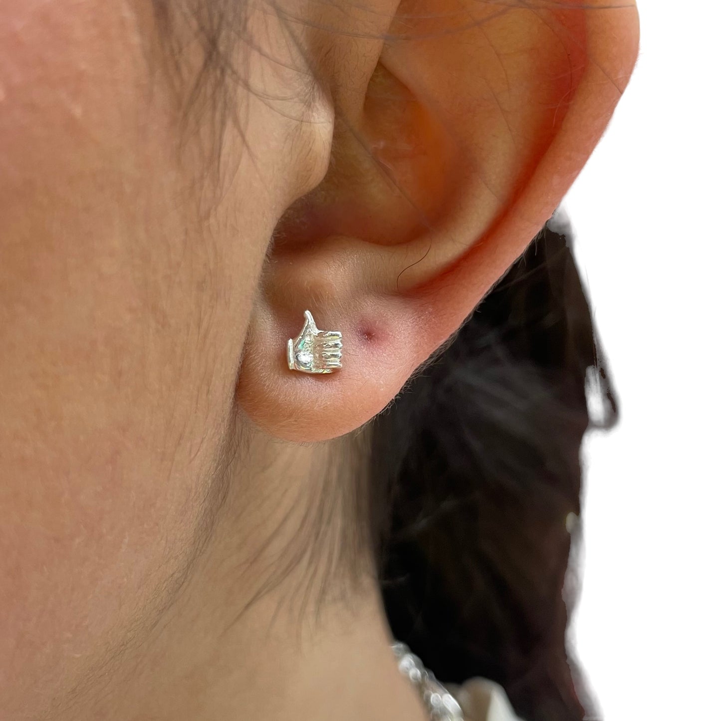 Stud earring with thumbs up &amp; down
