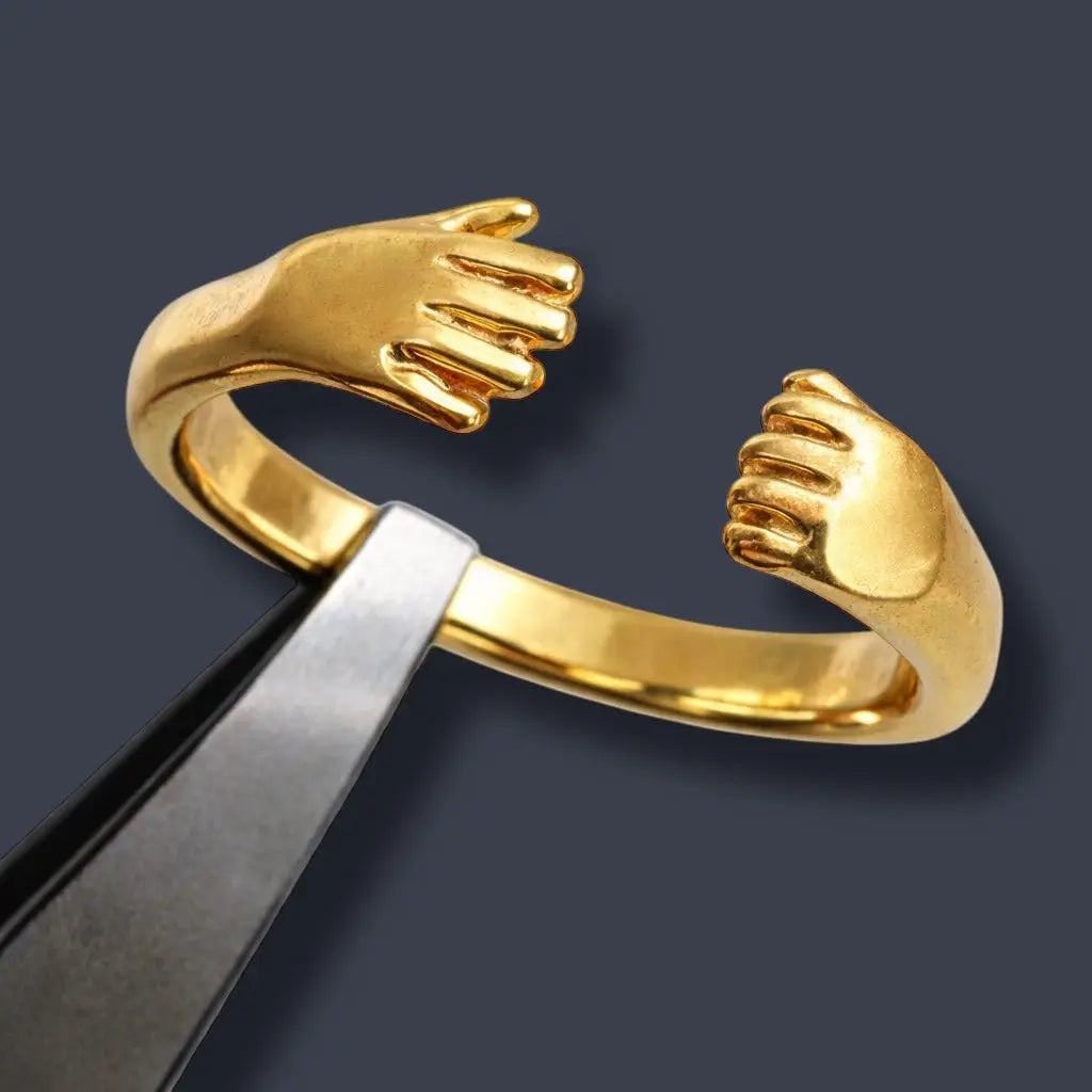 Kramen ring / öppen knuten hand L8Hasselblad